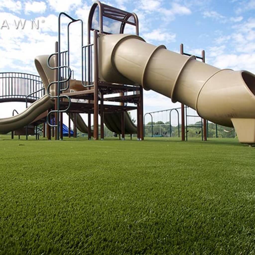 Beige slide installed on SYNLawn Artificial Grass